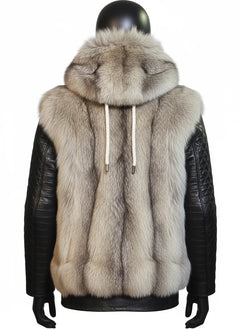 Fur vest with leather sleeves on a mannequin against a white background