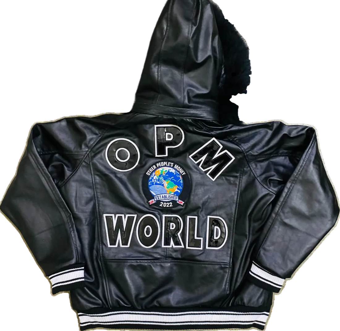 Black leather jacket with blue fox fur hood and embroidered opm logo on a white background