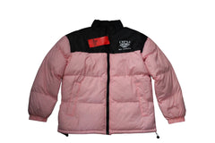 Pink puffer jacket with black accents and a red patch on a white background