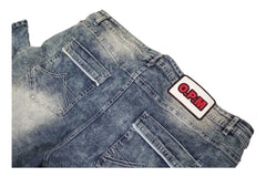 Folded blue jeans with a visible brand label on a white background