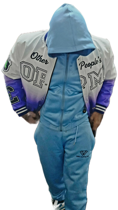 Person wearing a blue tracksuit with a blurred background