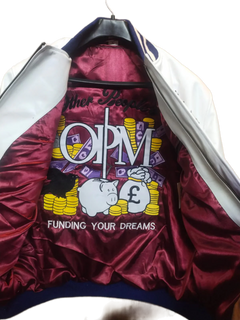 Maroon jacket inside lining with OPW logo and text on a white background
