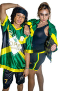 Two people wearing green and black sports outfits with visible branding on a white background