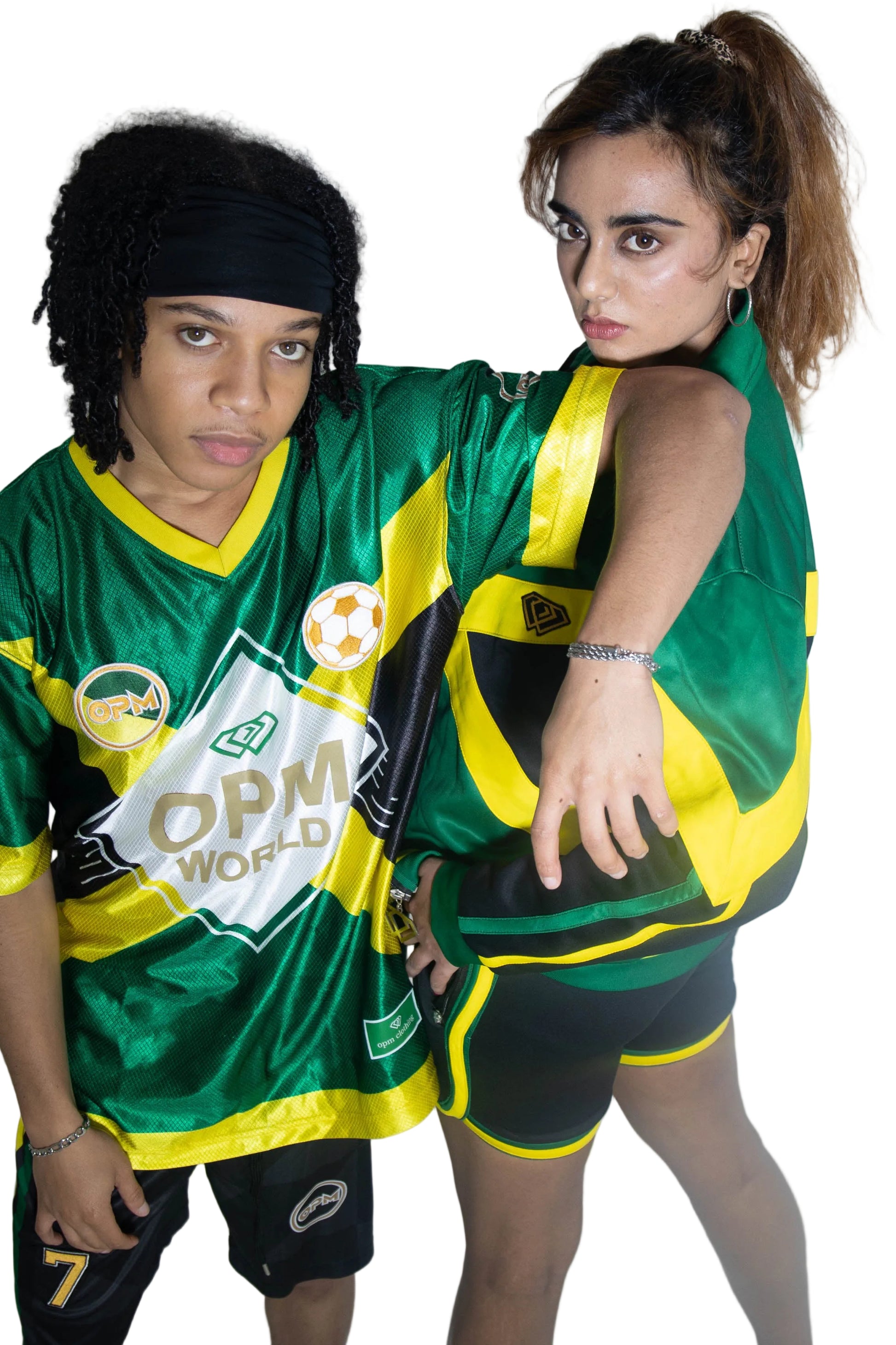 Two people wearing green and yellow sports jerseys with visible branding.