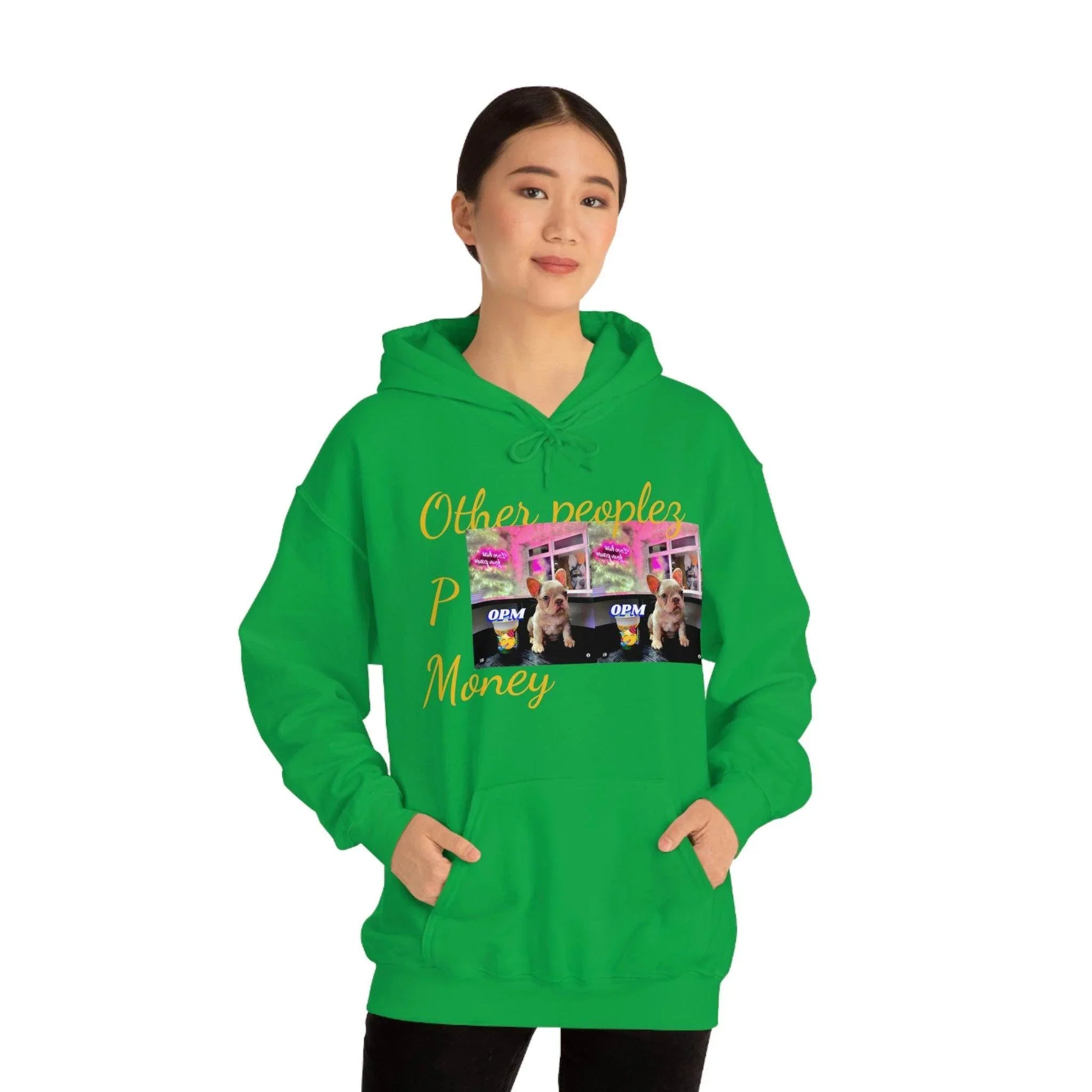 Woman wearing green hoodie with 'Other peoples Money' text and dog photo print, streetwear style