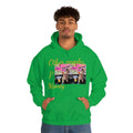 Man wearing green hooded sweatshirt with colorful dog graphic and 'Other people’s money' text