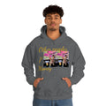Man in grey hooded sweatshirt with 'Other people's money' text and dog graphic on front