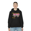 Woman wearing black graphic hoodie with 'Other People’s Money' text and colorful photo print