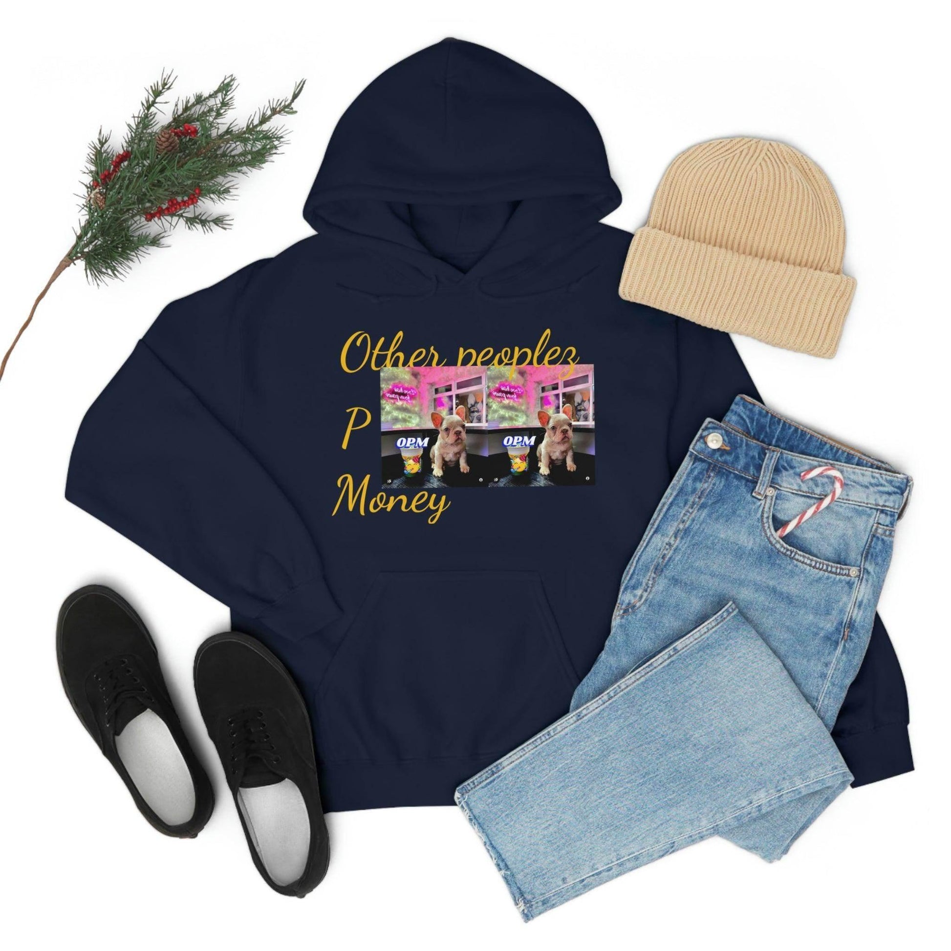 Navy hooded sweatshirt with 'Other people’s money' text and dog graphic, styled with jeans, black shoes, and beige beanie.