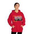 Woman wearing red unisex hooded sweatshirt with 'Other peoples Money' text and dog graphic.