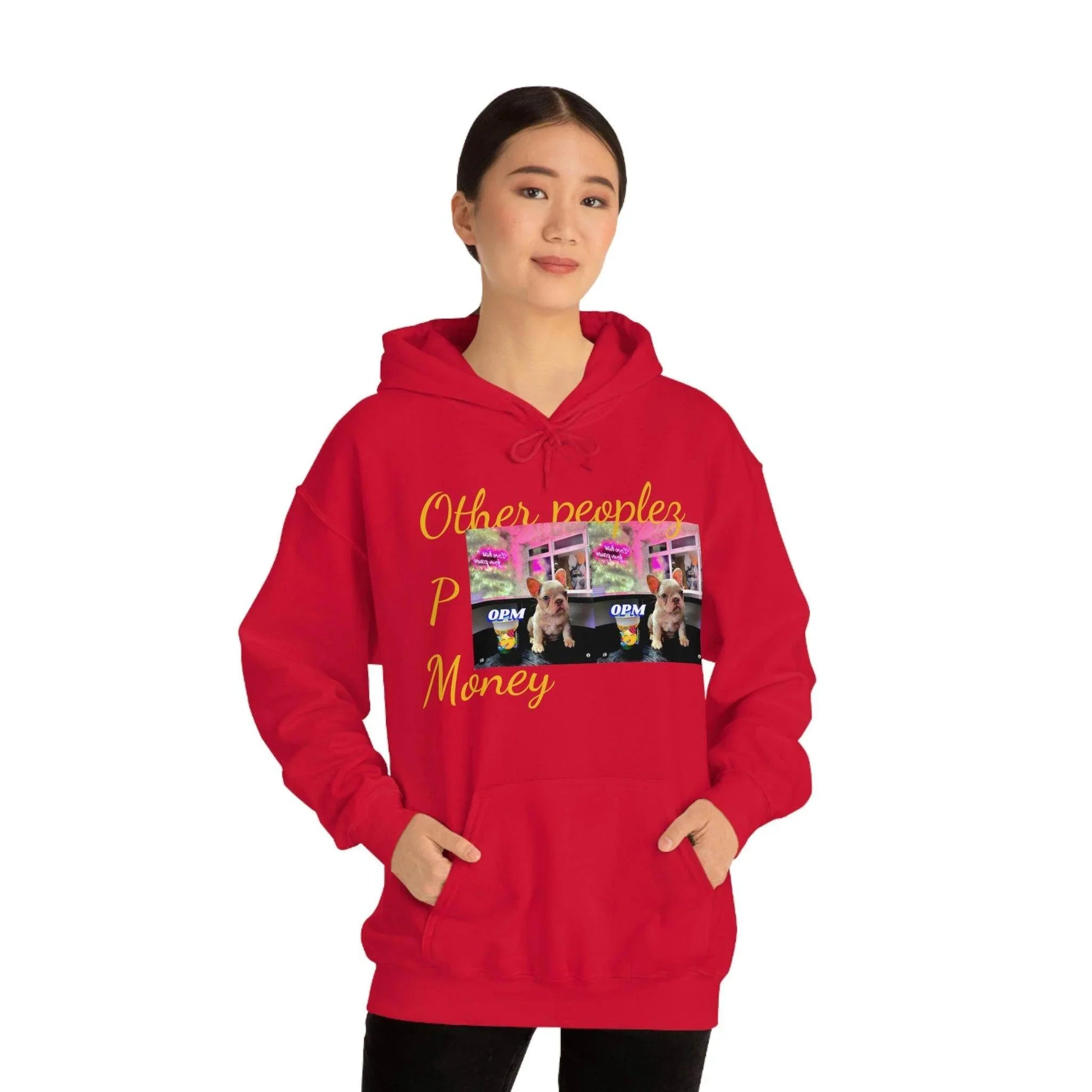 Woman wearing red unisex hooded sweatshirt with 'Other peoples Money' text and dog graphic.