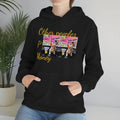 Woman wearing black hoodie with colorful dog print and 'Other peoples Money' text