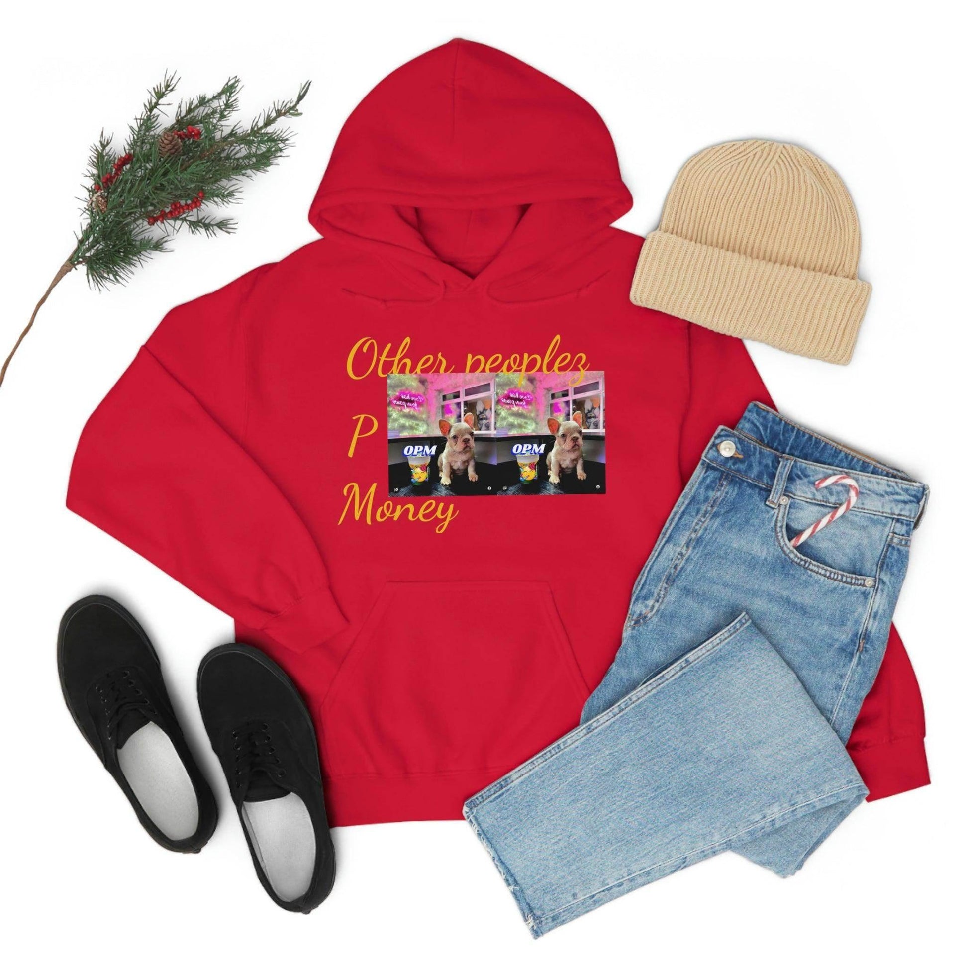 Red hooded sweatshirt with graphic of dog and text 'Other people’s Money', paired with jeans, black shoes, and beige beanie.