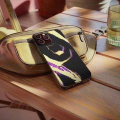 Stylish abstract OPM graphic phone case with gold and purple design on wood table