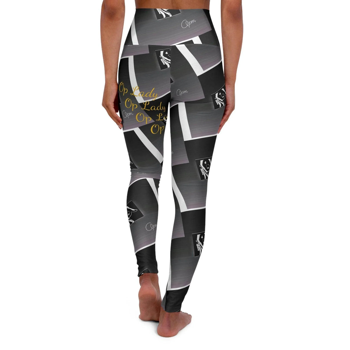 High-waisted women's leggings with black and grey abstract pattern and gold lettering