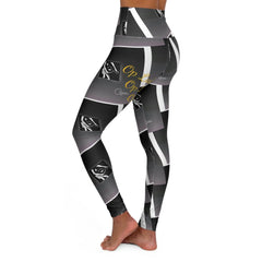 High-waisted women's leggings with abstract black, white, and gold graphic print pattern