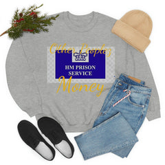 Grey sweatshirt with HM Prison Service logo, yellow 'Other Peoples Money' text, flat lay with jeans, shoes, and beanie