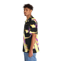 Man wearing a short sleeve black and yellow Hawaiian shirt with graphic pattern