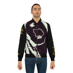 Man wearing black bomber jacket with bold abstract swirl pattern and gold script on sleeves