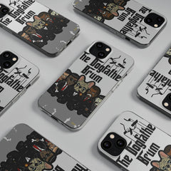 Grey iPhone cases with cartoon dogs in suits and 'The Dogfather Brum' text, modern streetwear style