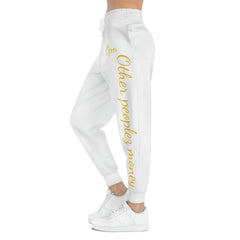 White joggers with gold script 'Other peoples money' and 'Opm' on the side, worn by a model