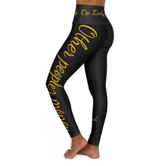 Black high-waisted leggings with gold script print, modeled on a white background