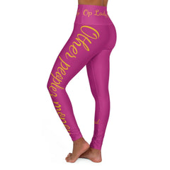 Pink high-waisted yoga leggings with yellow script detail, worn by woman on white background