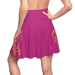 Woman wearing a vibrant pink skater skirt with yellow script design, viewed from the back.