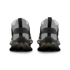 Rear view of black and grey mesh sneakers with chunky sole and pull tab, urban footwear
