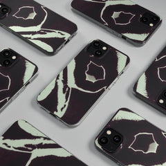 Soft phone cases with abstract black and white graphic pattern on gray background
