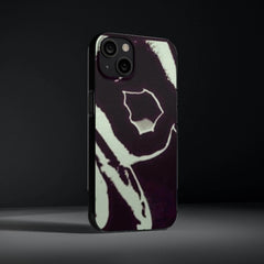 Black and white abstract graphic printed phone case for iPhone on dark background