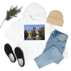 White hooded sweatshirt with 'Other Peoples Money' text and palace photo, styled with jeans, sneakers, and beanie.