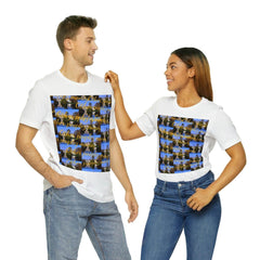 Two people wearing white unisex graphic tees with bold blue and yellow text design