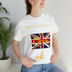 Woman wearing white t-shirt with Union Jack flag, gold lettering, and streetwear style
