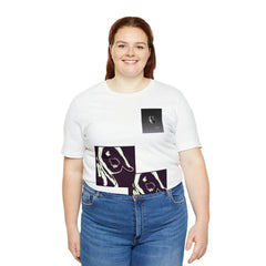 Smiling woman wearing a white unisex streetwear tee with black hand graphic prints, blue jeans