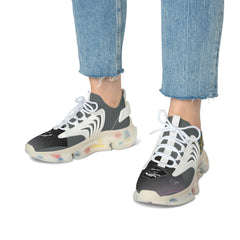 Women’s mesh sneakers with white laces, chunky multicolor sole, worn with cropped jeans