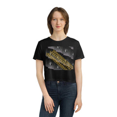 Woman wearing black cropped tee with bold gold and white graphic text design