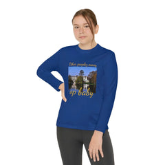 Youth in blue long sleeve graphic streetwear tee with 'Other peoples money op baby' text
